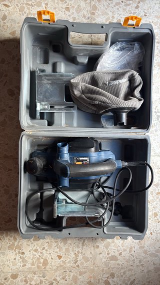 Cepillo eléctrico con maletín