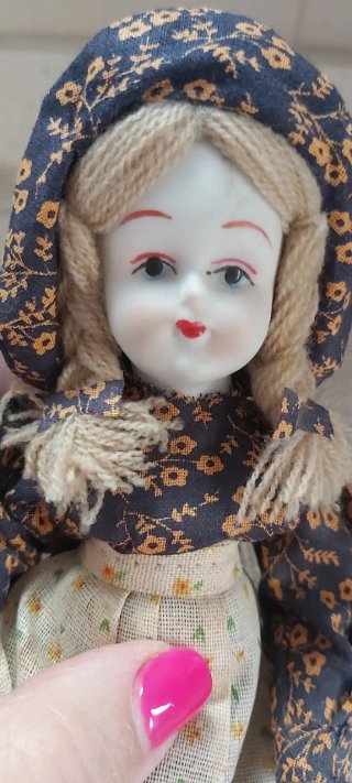 Muñeca de porcelana vintage