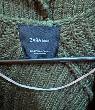 Cárdigan oversize Zara verde.
