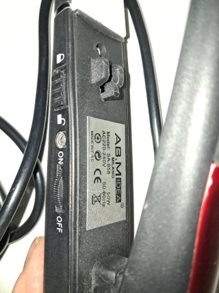 Piastra per capelli nera e rossa