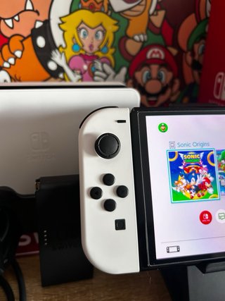 Nintendo Switch OLED Blanca COMO NUEVA con plastic