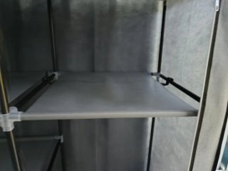 Armario ropero de tela gris y plastico