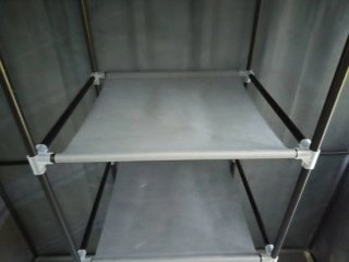 Armario ropero de tela gris y plastico