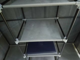 Armario ropero de tela gris y plastico