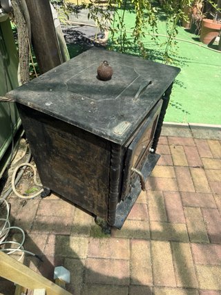 Chimenea de hierro forjado con plancha