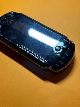 Sony PSP 1004 Negra + 4 Juegos UMD