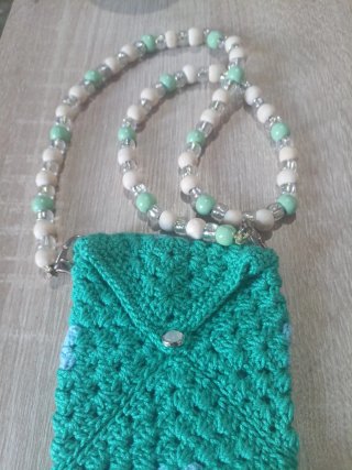 Funda móvil tejida a mano