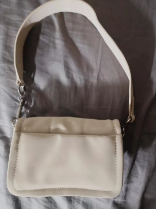Bolso beige acolchado