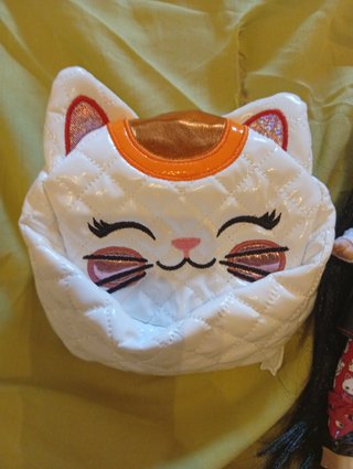 Muñeca Na Na Na Surprise con bolso gato
