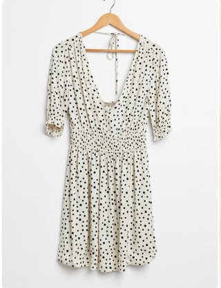 Vestido lunares beige y negro