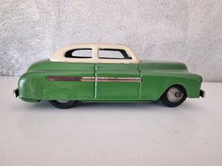 Antiguo coche de fricción a Rico