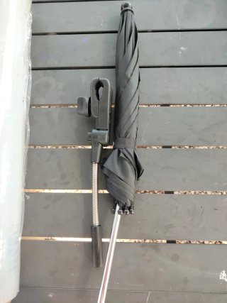 Sombrilla silla de paseo negra y plástico lluvia