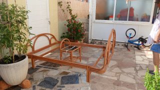 Cama de ratán estilo arco