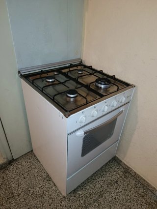 Cocina de gas 4 fuegos y horno Gralux