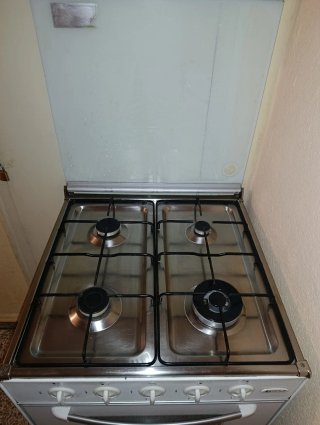 Cocina de gas 4 fuegos y horno Gralux