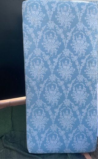 Colchón de tela con estampado floral