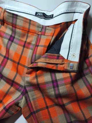 Pantalón cuadros flare naranja