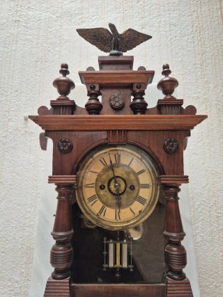 Reloj de péndulo antiguo