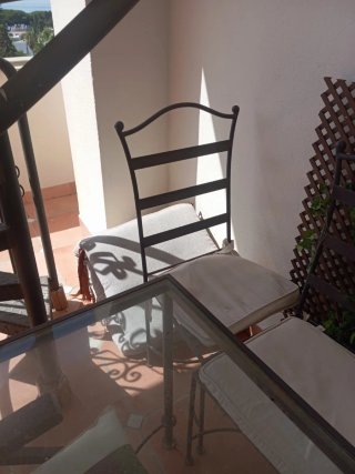 Juego mesa cristal y 4 sillas forja