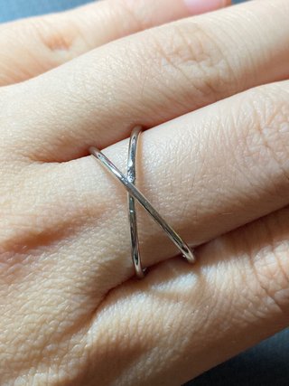 Anillo acero plateado entrelazado