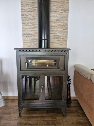 Chimenea de leña metálica con cristal