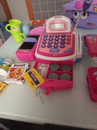 Caja registradora de juguete rosa
