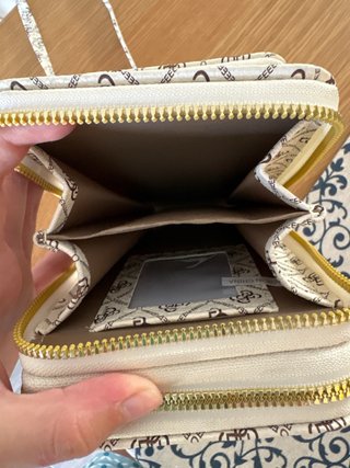 Bolso de mano blanco con estampado