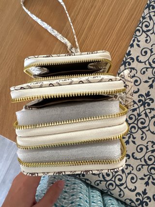 Bolso de mano blanco con estampado