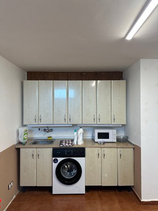 Muebles de cocina beige y madera