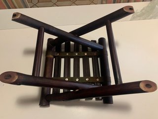 Taburete plegable de madera