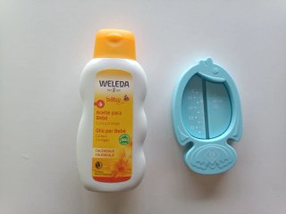Aceite Weleda Bebé + Termómetro Baño