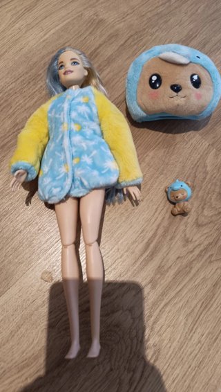 Muñecas de peluche y figura de acción