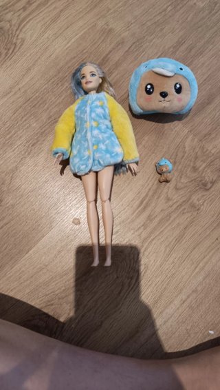 Muñecas de peluche y figura de acción