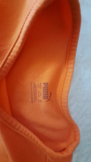 Conjunto deportivo Puma naranja y azul