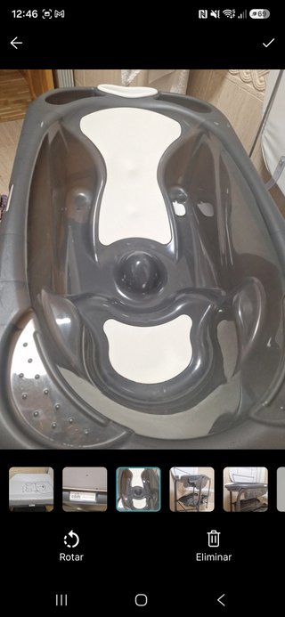Cambiador bañera gris marca. No tiene desperfectos