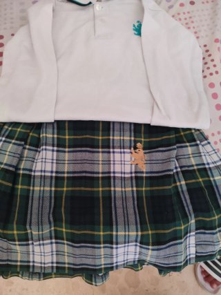 Uniforme Abad Sola. Polo Blanco y Falda