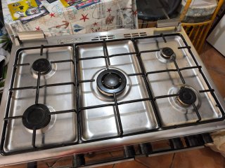 Cocina Corberó 5 fuegos + horno gas 60L