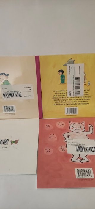 14 libros infantiles ilustrados en francés.