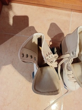 Patines blancos de 4 ruedas