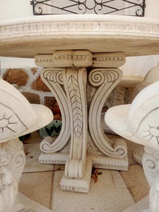 Conjunto mesa y 5 sillas de jardín piedra