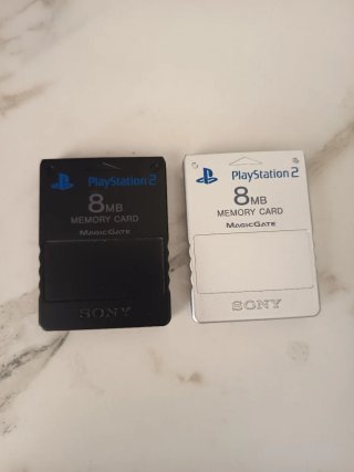 Consola PlayStation 2 con 2 mandos y 7 juegos