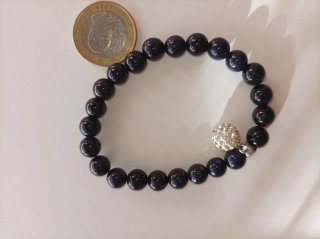 Pulsera de cuentas azules con detalle brillante