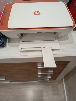 Impresora HP Naranja y Blanca