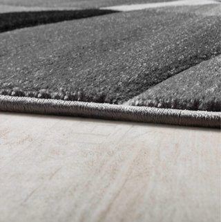 Alfombra moderna geométrica gris, negra y blanca