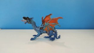 Dragón de juguete azul y naranja