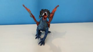 Dragón de juguete azul y naranja