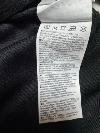 Nike Track Jacket Negra con Detalles Turquesa Rosa