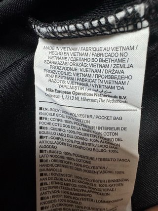 Nike Track Jacket Negra con Detalles Turquesa Rosa