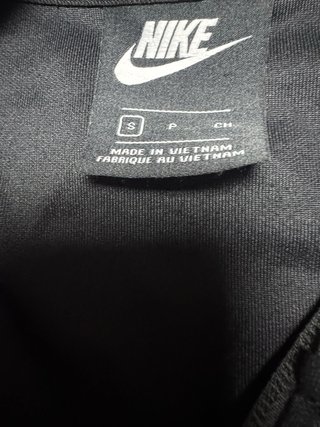 Nike Track Jacket Negra con Detalles Turquesa Rosa