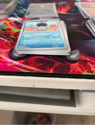 120 Cartas Pokémon Reverse Holo de diferentes expa
